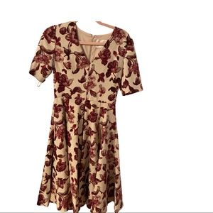 Gal Meets Glam beige and burgundy short sleeved dress. Great for fall.